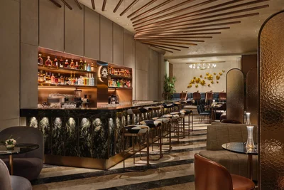 interior photography at 33 club in Singapore. This is a photo of the main bar and seating area showing an overview of the club.