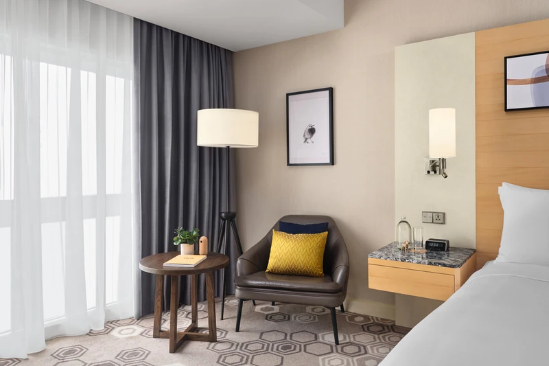voco Orchard Singapore mockup room lounge wide